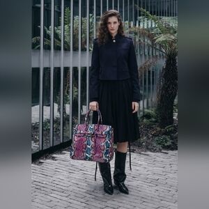 28. Stylish Pink and Blue Snake Print Handbag!